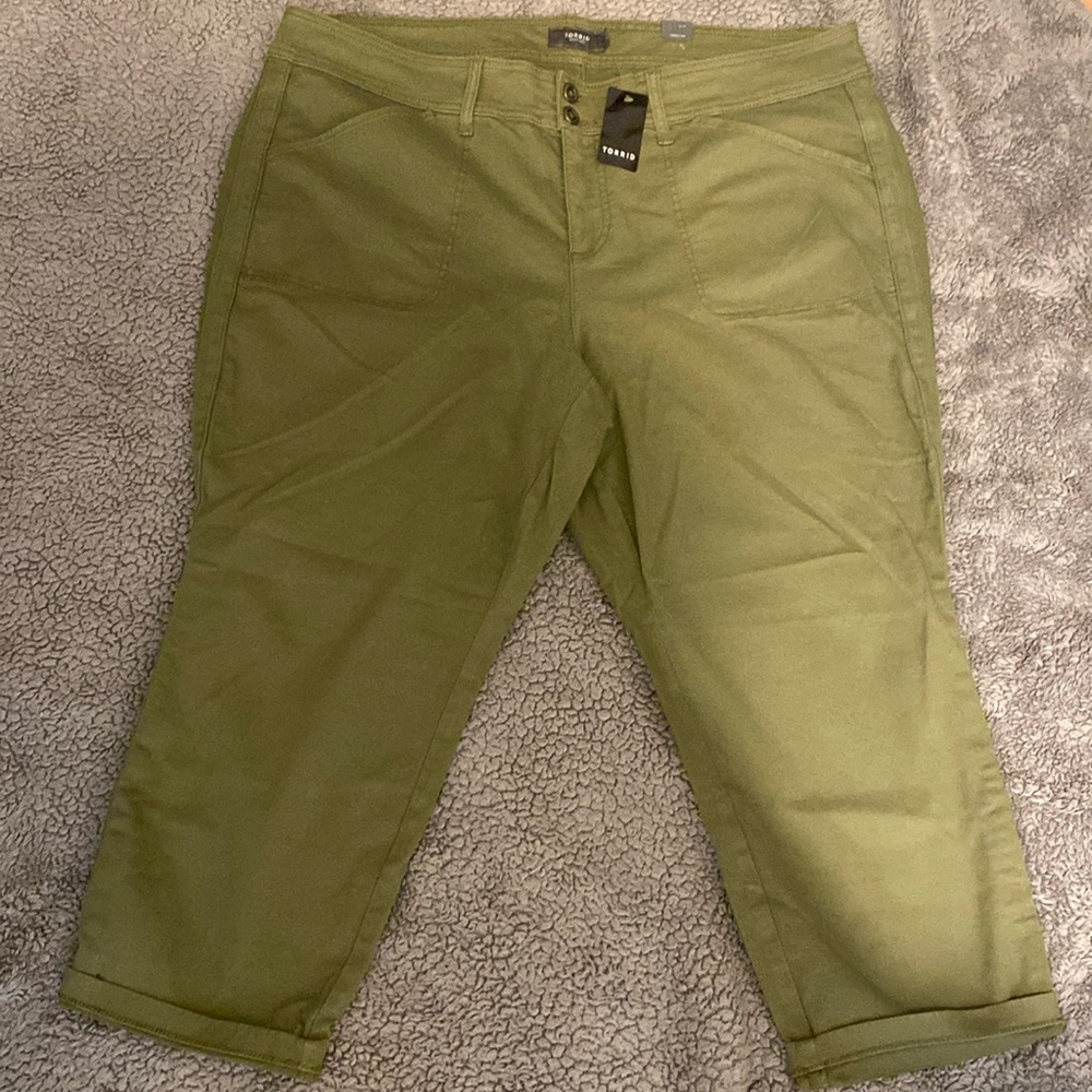Olive green capris with the tag still attached